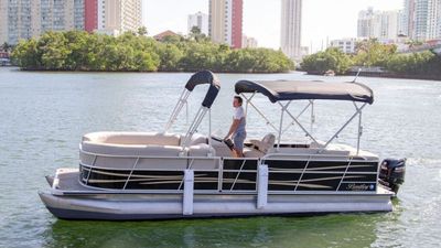 Photo of 24’ Bentley pontoon boat in Sunny Isles Beach, FL.